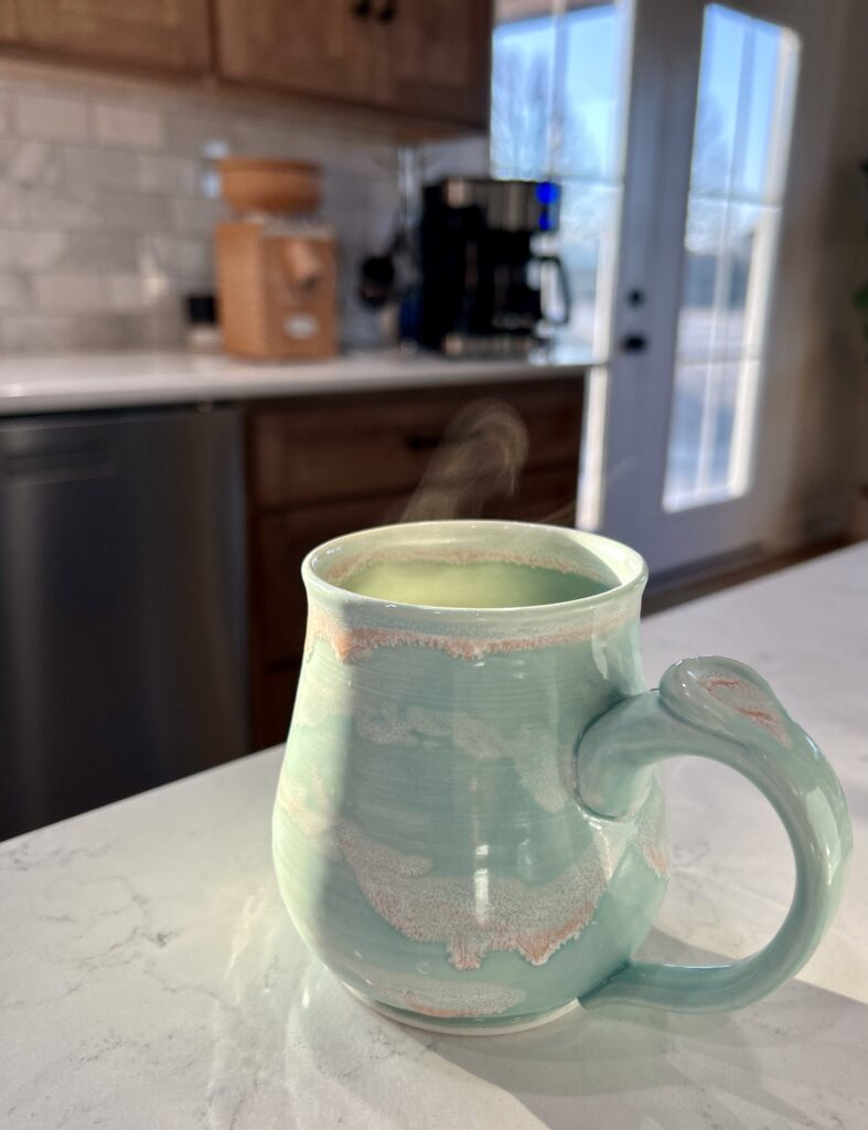 steaming cup of coffee