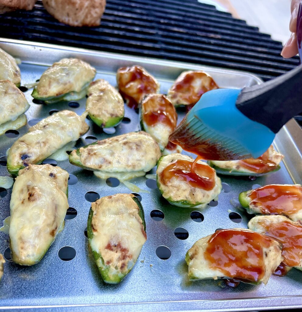 Jalapeño Poppers brushed with BBQ sauce