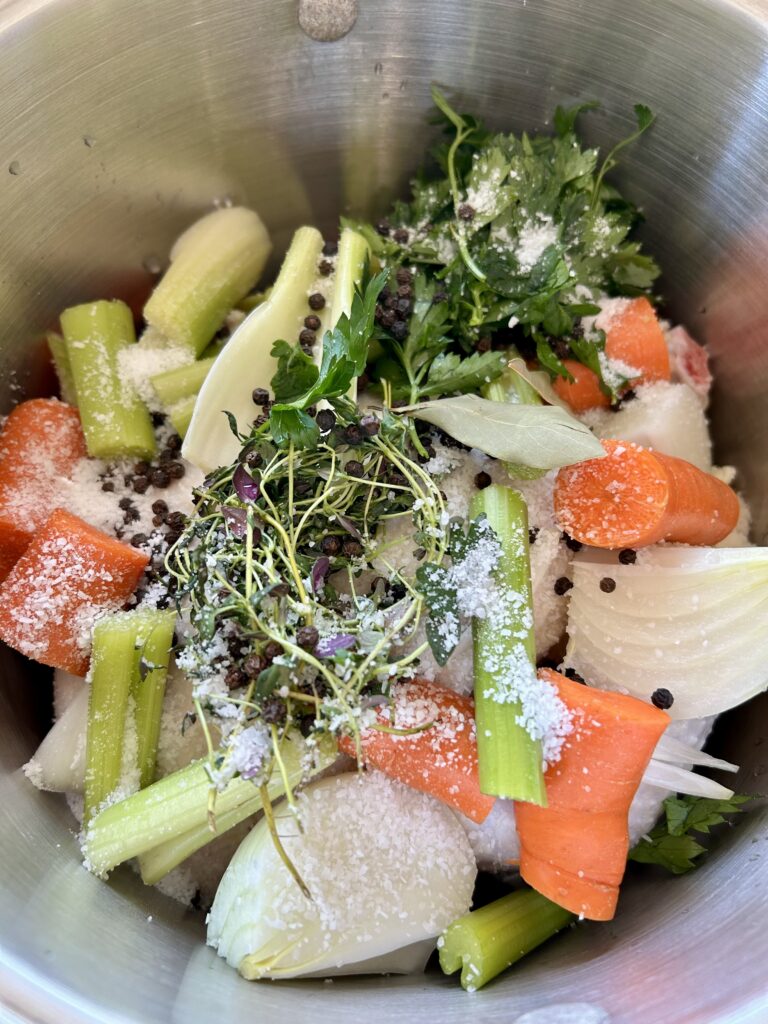 ingredients for chicken broth in pot