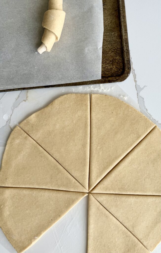 cutting and shaping crescent rolls with fresh milled flour